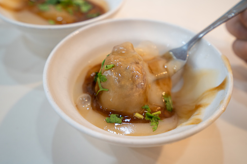 Taiwanese meatball - Delicious street food Bawan (Ba wan), steamed and deep fried starch wrapped round shaped dumpling with pork inside