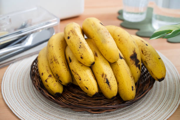 istock A bunch of fresh banana on a dining table in a modern kitchen. 2090592921