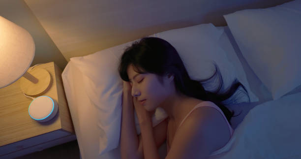 istock asian woman use white noise 2090616415