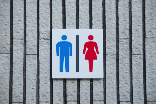 Outdoor unisex restroom signage in Tokyo, Japan, 2023