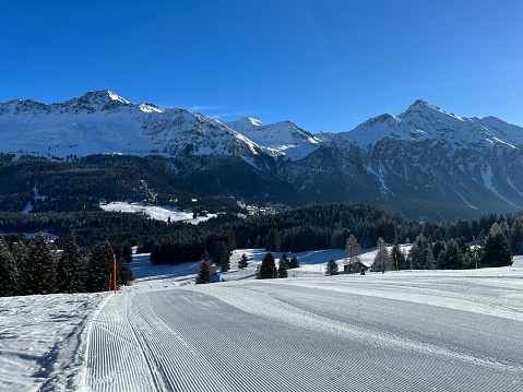 Amazing sport-recreational snowy winter tracks for skiing and snowboarding in the area of the tourist resorts of Valbella and Lenzerheide in the Swiss Alps - Canton of Grisons, Switzerland (Kanton Graubünden, Schweiz)