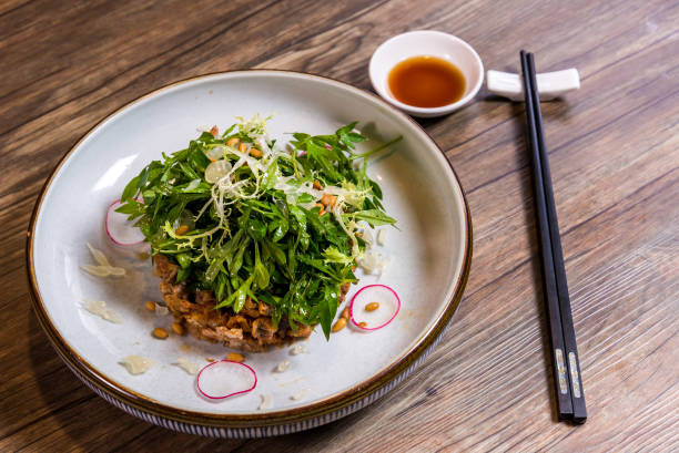 istock deep fried chicken cutlet omelette egg with green vegetable salad appetiser in plate on wood table restaurant chinese banquet halal vegetable food asian cafe menu 2090668718