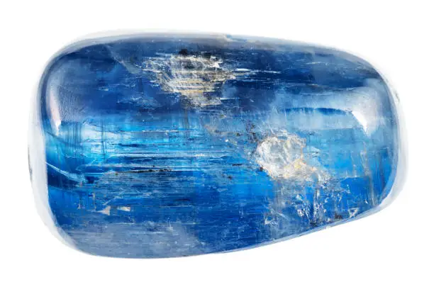 specimen of natural rolled transparent blue kyanite crystal cutout on white background