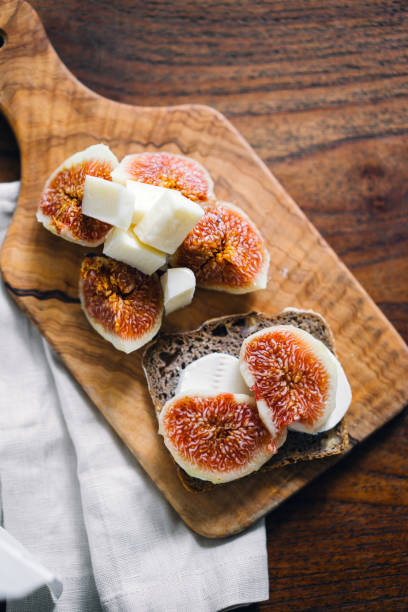 Healthy fig bruschetta with sourdough rye bread and cheese