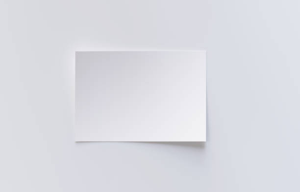 Realistic blank paper sheet mockup with shadow in A4 format isolated on white background