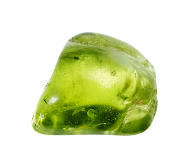 specimen of natural polished peridot crystal cutout on white background