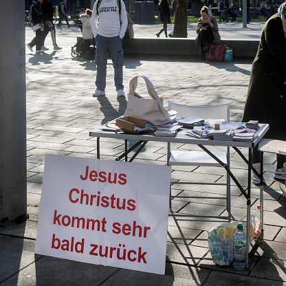 Augsburg, Germany - March 02, 2024: A placard displayed on a street proclaming Jesus Christ will return very soon. Literal translation.