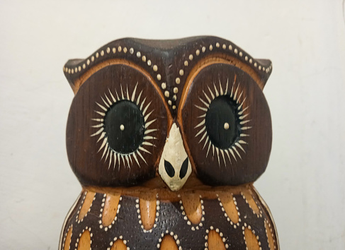Head of vintage wooden owl statue
