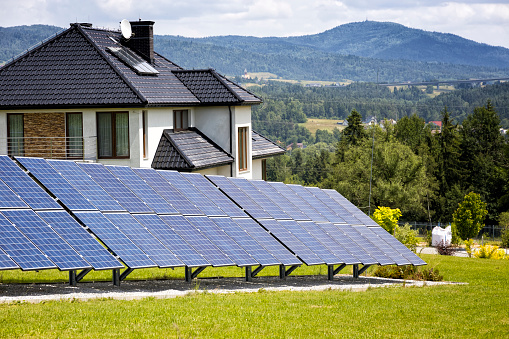 Residential home with rows of solar panels in Skawa, small tourist villlage in Malopolskie province, Poland