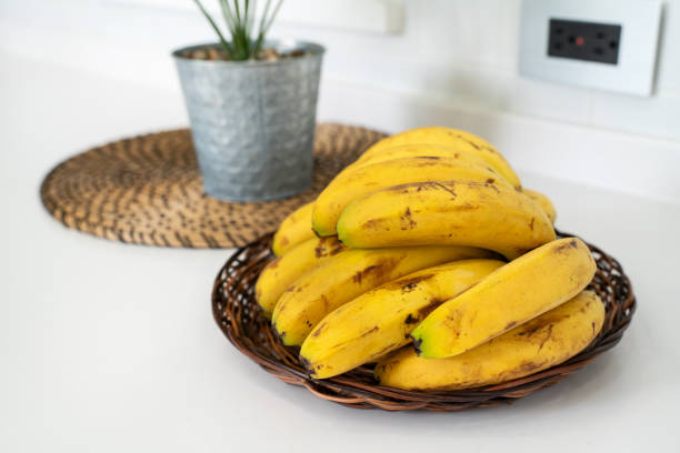 istock A bunch of fresh banana in a modern kitchen. 2090788475