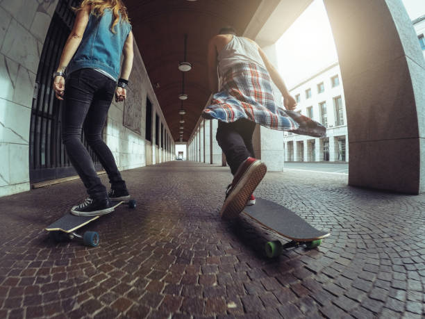 istock Friends in Rome on a longboard skateboard 2090796925