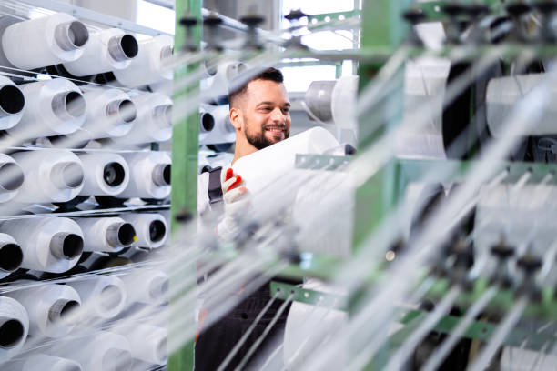 istock Working in textile manufacture factory. 2090884605