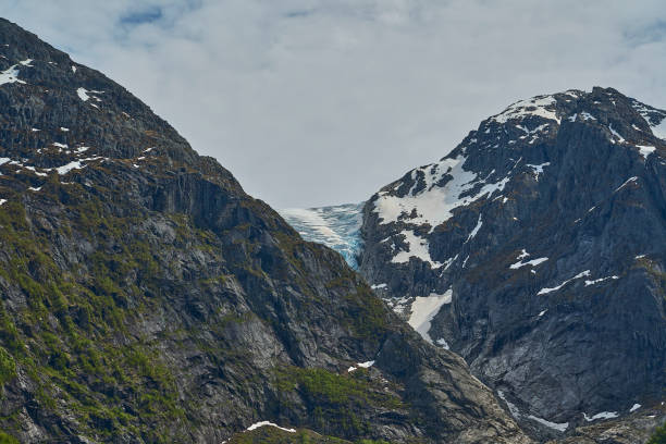 istock Bondhusbreen Glacier hanging over the Bondhusvatnet Lake. 2090924418