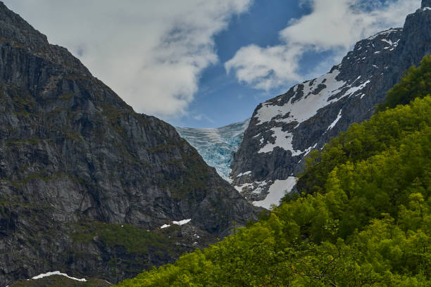 istock Bondhusbreen Glacier hanging over the Bondhusvatnet Lake. 2090925983