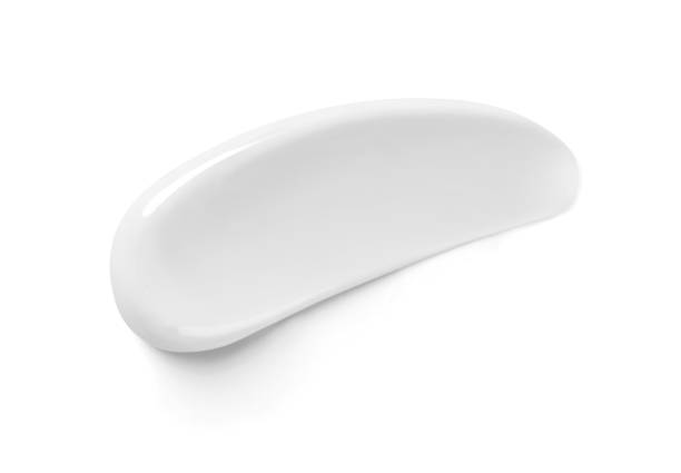 istock White cosmetic cream stroke isolated on white. 2090993008
