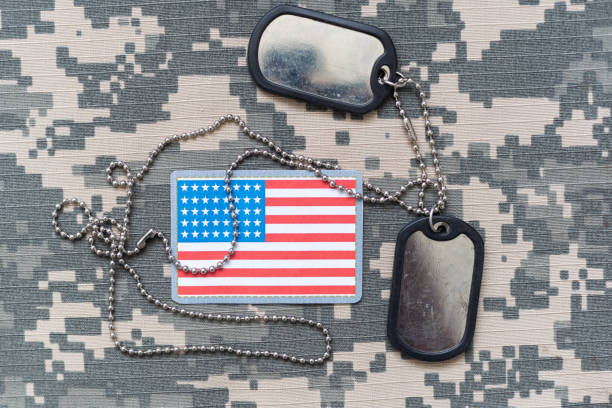istock Military ID tags with USA flag on uniform background 2091033491