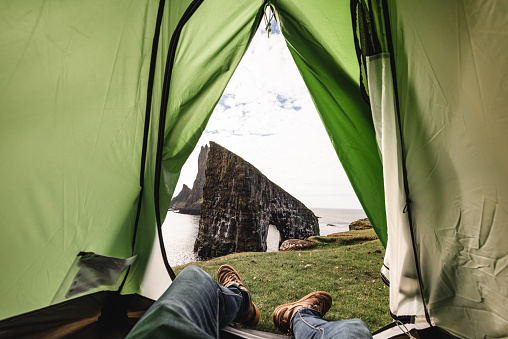 Man inside the tent at the Faroe Islands