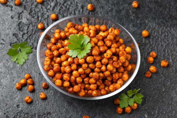 istock Roasted spicy chickpeas in bowl. Healthy snack. 2091063492