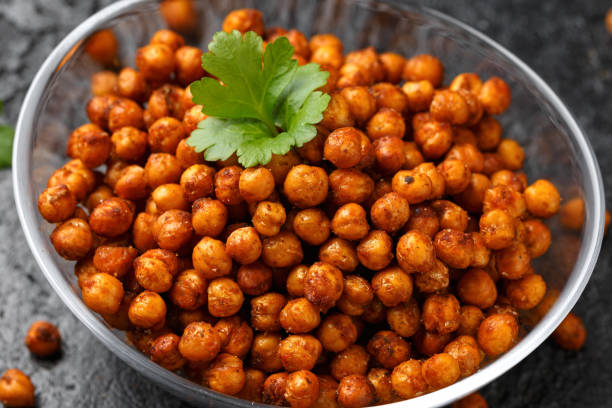 istock Roasted spicy chickpeas in bowl. Healthy snack. 2091063497