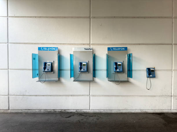 istock Group of payphone on building wall 2091076303