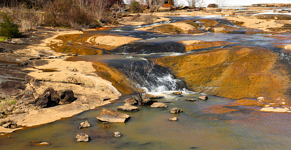 The Towaliga River winds its way through the rocks in this shot taken at High Falls State Park in Jackson, Georgia.