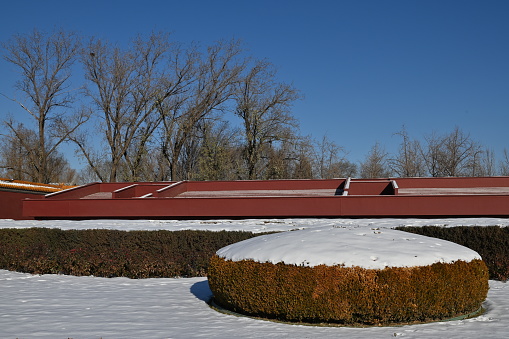 Beijing, China - December 19 2023: Creative shots of the Forbidden City of China, against an ancient Chinese culture, shot during winter where rivers were iced and snow are everywhere on the ground