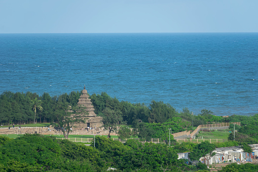 Picture of Shore temple at UNESCO world heritage site of Mahabalipuram and sea in the background. Ajanta, Ellora, Hampi ancient stone sculpture carvings sacred pilgrimage archeology tourist, sanatan
