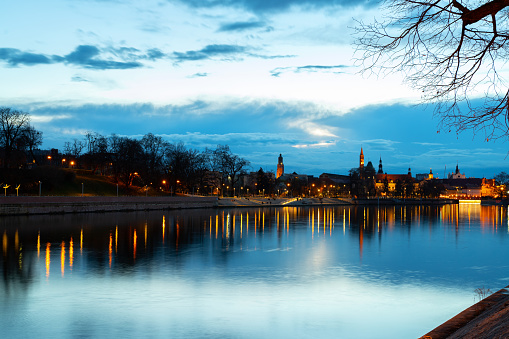 Night View on Wroclaw Old Town. Island and Cathedral of St John on river Odra, find recreation zone on the river bank. Wroclaw, Poland.