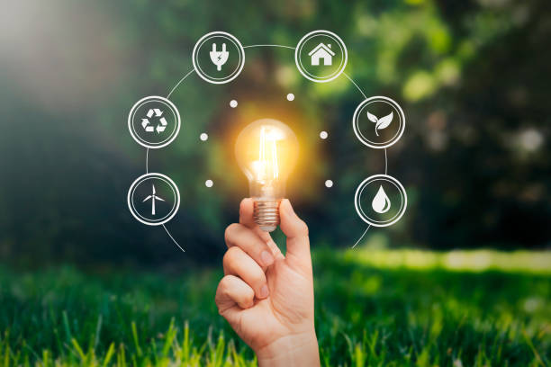 istock A hand holding a light bulb, eco symbols 2091235127