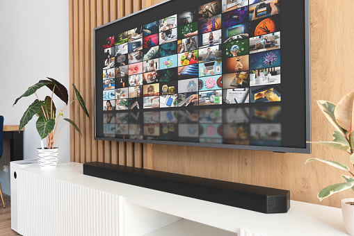 TV streaming media in living room. Multimedia video streaming concept