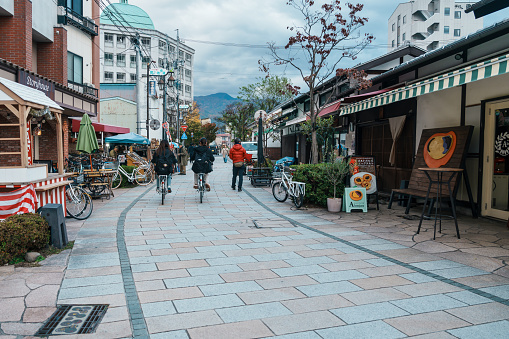 Nawate Street or Frog shopping Street, locate between Yohashira Shrine and Metoba River, midpoint between Matsumoto Station and castle. Landmark for tourist attraction. Nagano, Japan, 12 November 2023