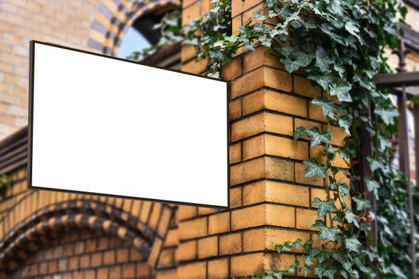 istock Blank sign on brick facade mock up 2091245017