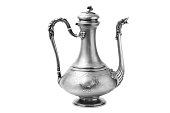 Antique metal vessel with spout and handle isolated on a white background.