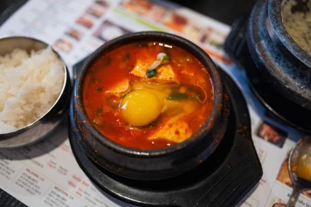 Whole chicken soup with medicinal herbs and scorched rice