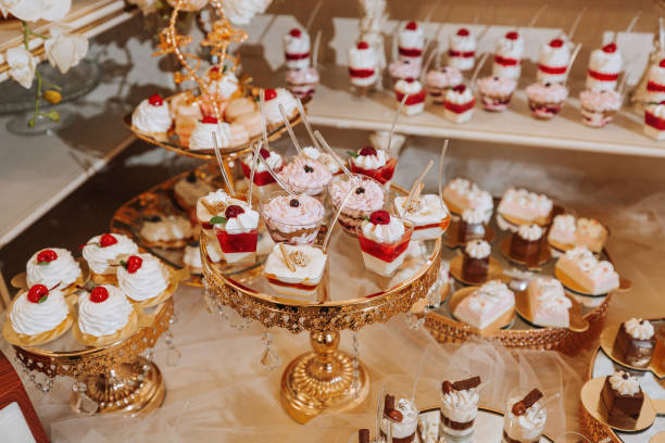 istock A delicious wedding. Candy bar with various chocolates. Fruit table. Celebration concept. Fashionable desserts. Table with sweets, candies. 2091278387