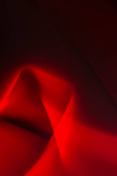 istock Abstract red smoke and light on a black background with smooth lines. Copy space. Design element. 2091286363