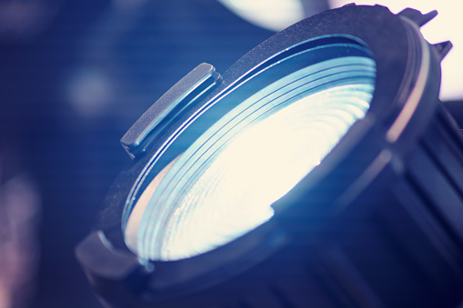 Close-up of a professional lamp with blue light. Shallow depth of field.