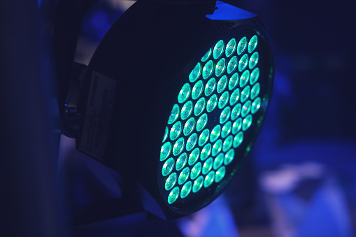 A closeup shot of a colorful lamp with a lot of blue rays