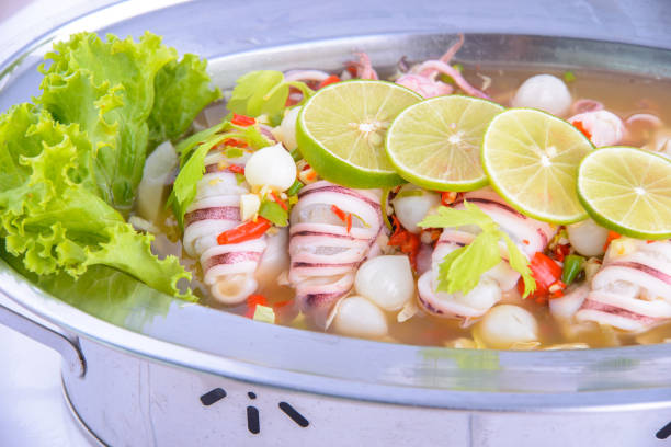 Spicy Squid Salad on the white background.