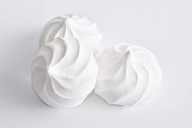 istock Fluffy meringue cakes close up view 2091326448