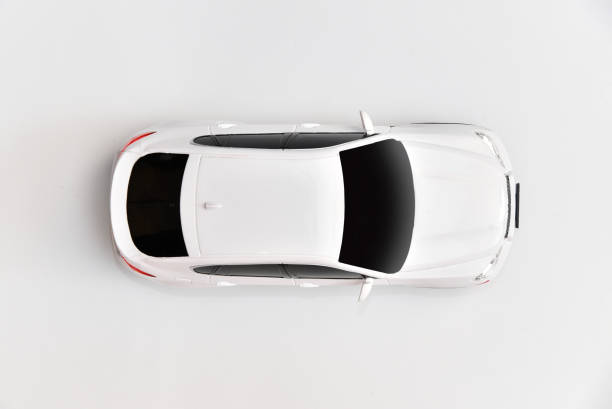 car top view on the white background surface with copy space. driving training concept. - hemen üstünde stok fotoğraflar ve resimler