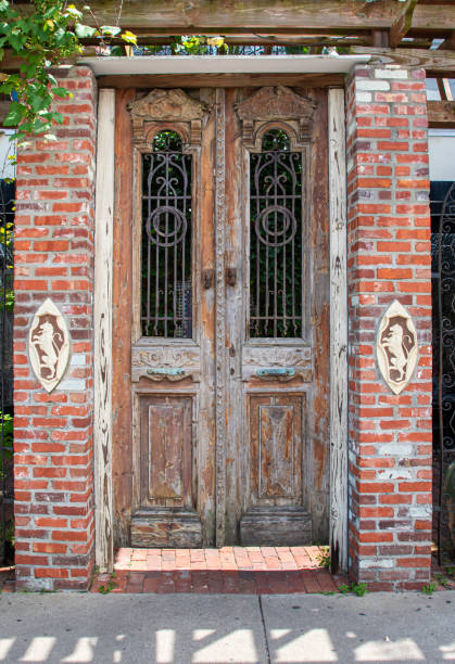 Antique wooden doorway with brick sides