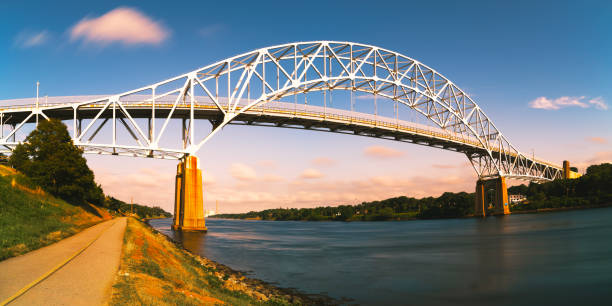 istock Sagamore Bridge the Landmark Architecture and Riverbank Footpath at Twilight along Cape Cod Canal on Cape Cod, Massachusetts, USA, Long Exposure photo 2091355127