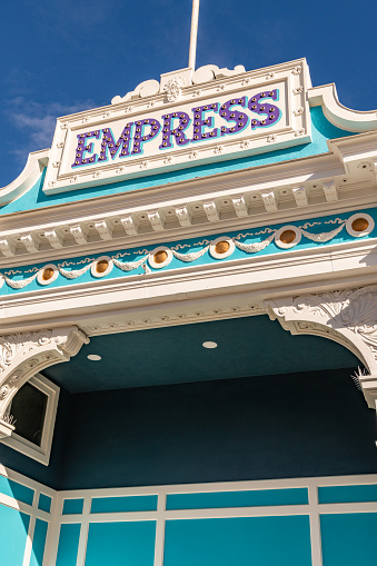 Magna, UT, US-March 6, 2024: The colorful entrance to the historic Empress Theatre along small town main street.
