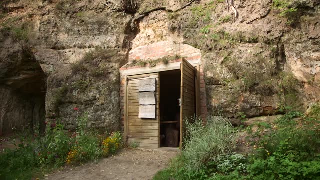 Open Cave Door in the Rock. Cafe