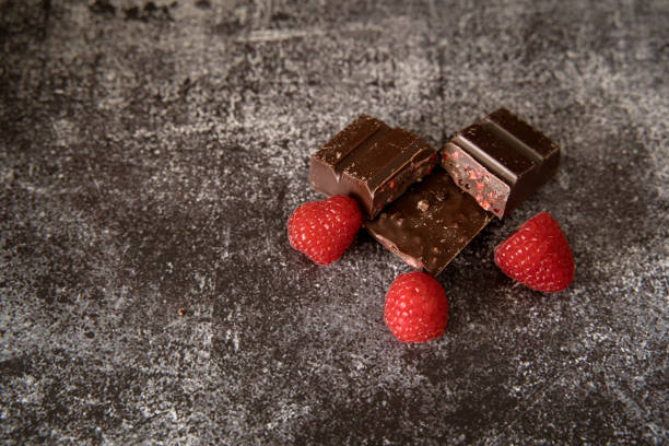 istock Chocolate chips with dried fruit and fresh raspberries seen from above 2091484462
