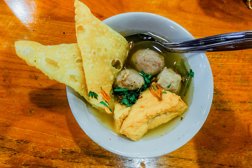 Indonesian meatball named Bakso with tofu and chips