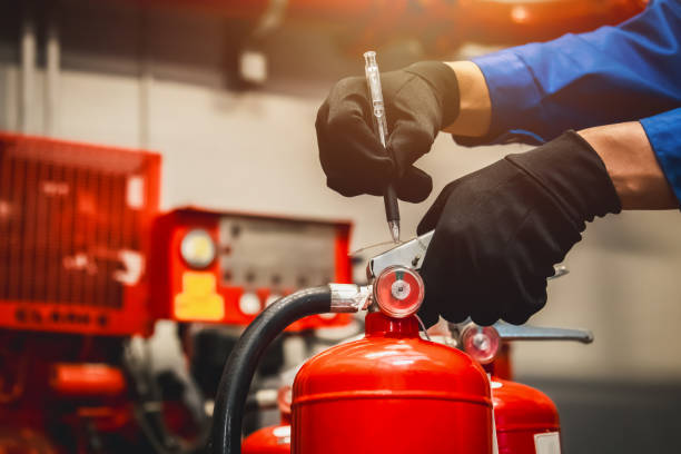 istock Engineer check fire extinguisher tank in the fire control room for safety in factory or industry. 2091536406