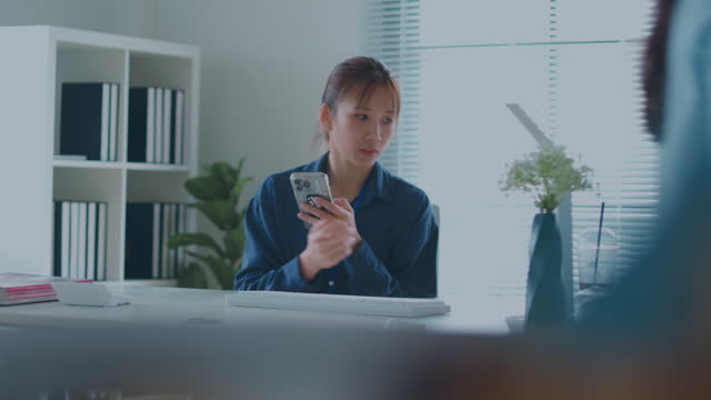 Beautiful business woman using smartphone texting sending emails successful female executive checking messages on mobile phone arriving at workplace.