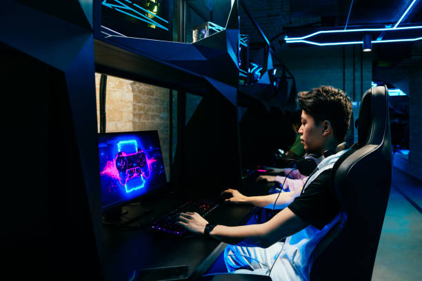 istock Multiethnic group of young friends playing videogames 2091657080